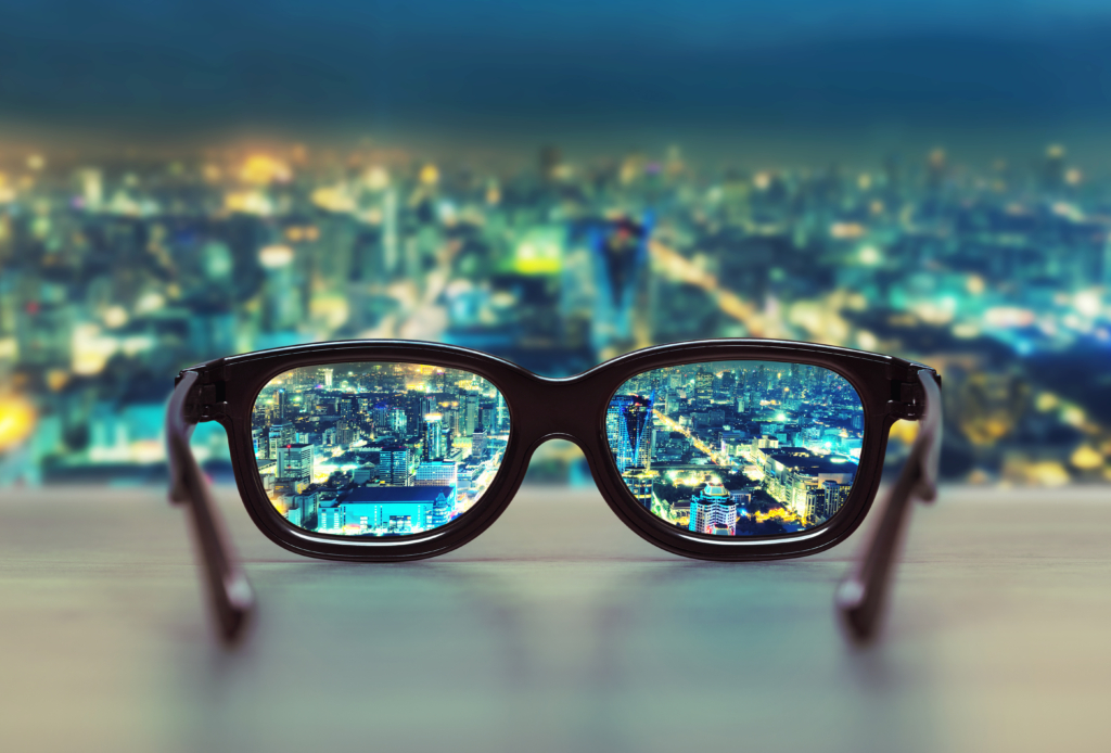Night Cityscape Focused In Glasses Lenses
